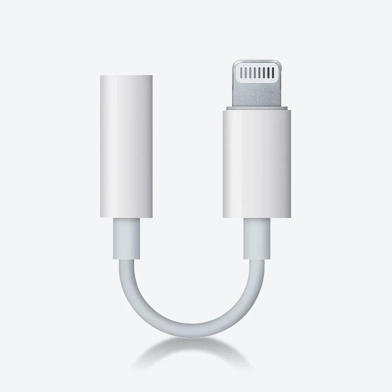 Hvit lightning-adapter til 3,5 mm hodetelefonkontakt, på hvit bakgrunn